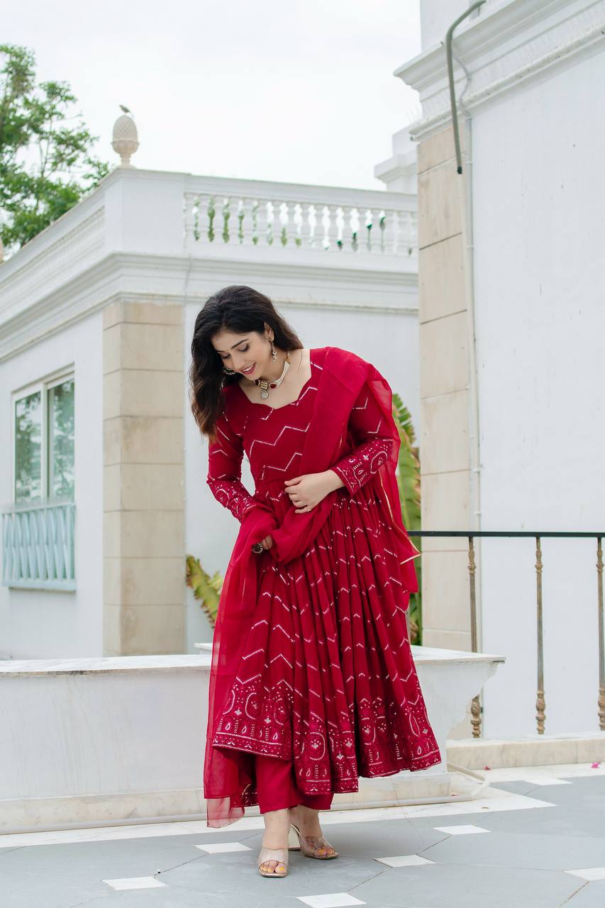 Grace in Every Twirl: Festive Red Magic Designer Anarkali Suit